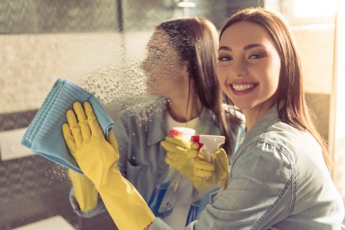 Protected carpet cleaning work in progress with safety-focused methods